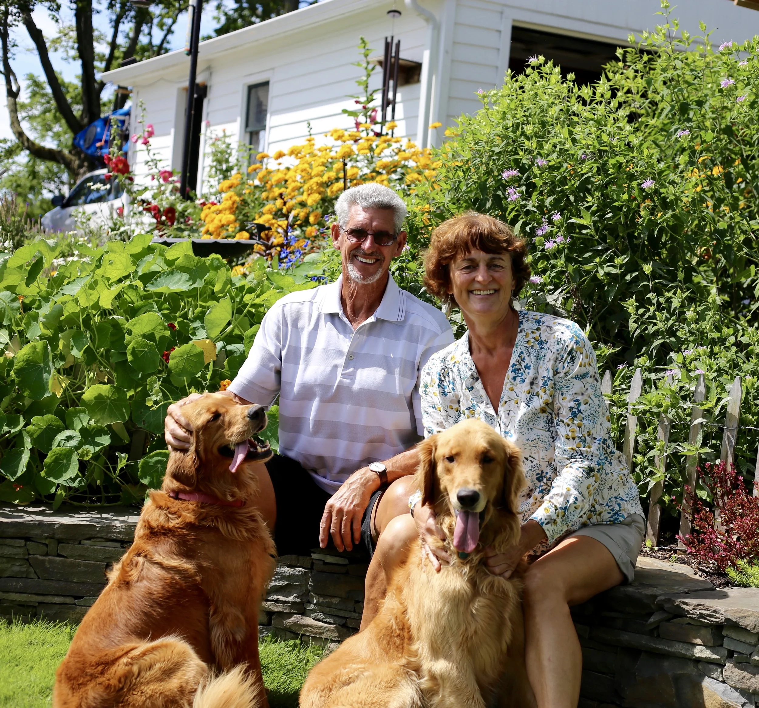 couple with 2 dogs